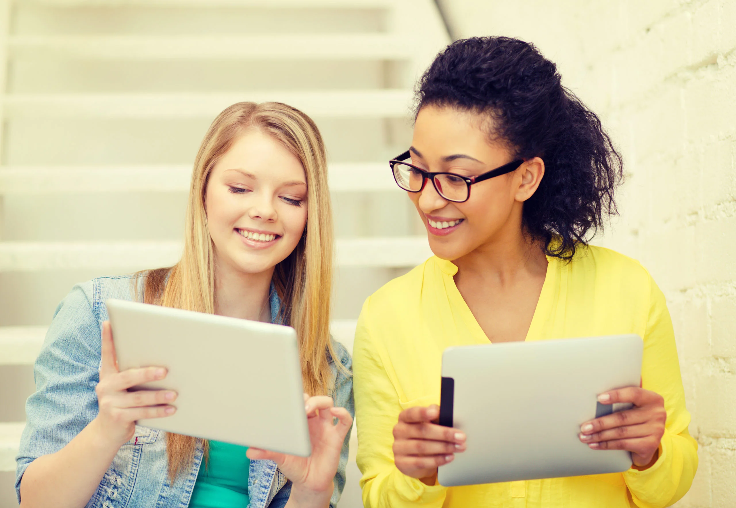 students-reviewing-tablets